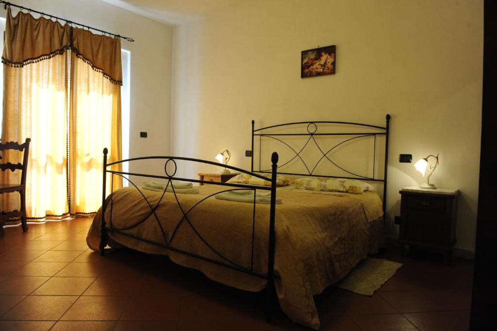 Lova arba lovos apgyvendinimo įstaigoje Camere Il Meoccio