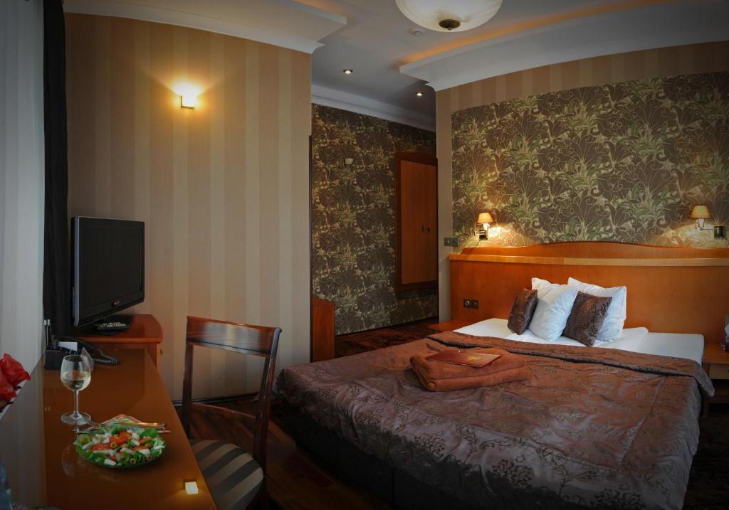 מיטה או מיטות בחדר ב-Villa Solankowa