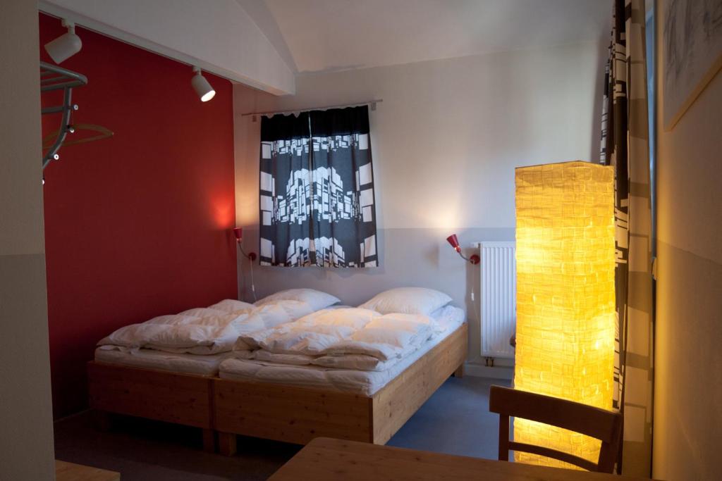 Postel nebo postele na pokoji v ubytování Babelfish Hostel