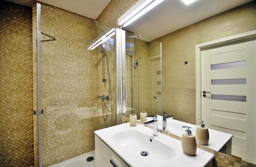 Kúpeľňa v ubytovaní Apartament Lazur Polanki Park