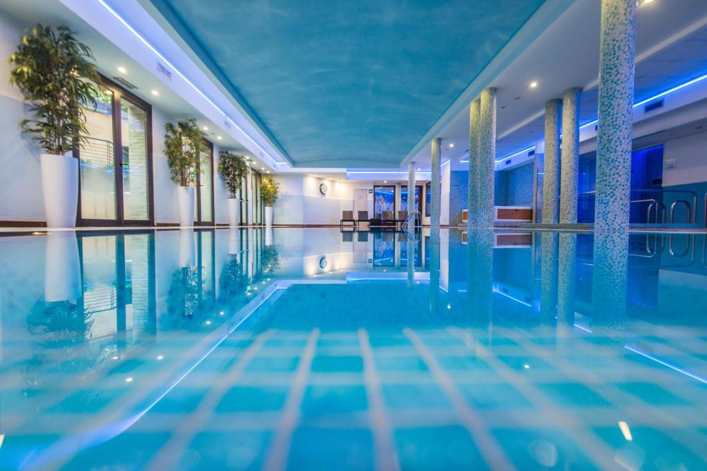 The swimming pool at or close to As Hotel Cambiago
