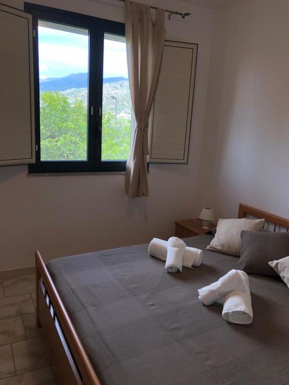 Postel nebo postele na pokoji v ubytování Casa Vacanze Alcantara