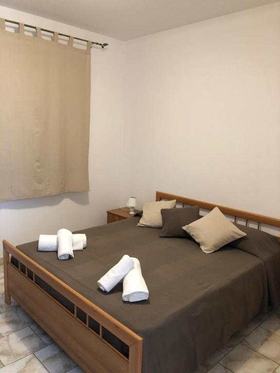 Postel nebo postele na pokoji v ubytování Casa Vacanze Alcantara