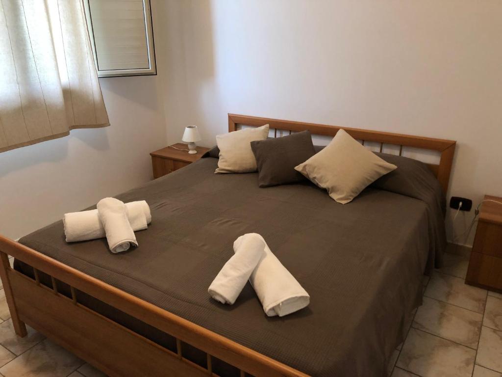 Postel nebo postele na pokoji v ubytování Casa Vacanze Alcantara
