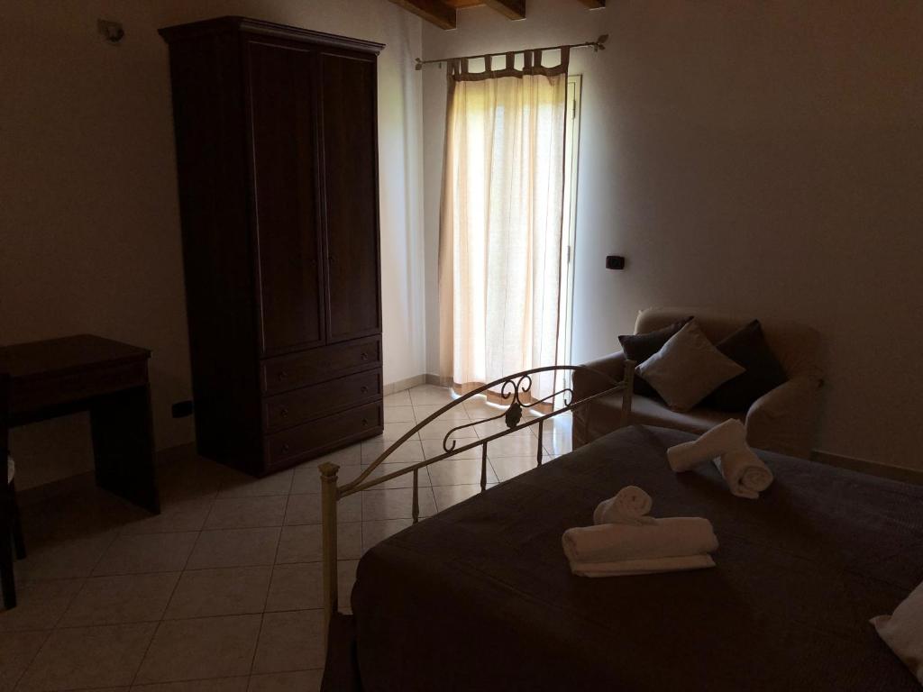 Postel nebo postele na pokoji v ubytování Casa Vacanze Alcantara