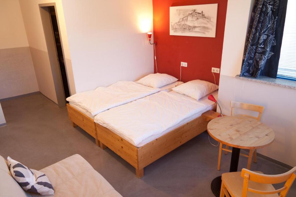Postel nebo postele na pokoji v ubytování Babelfish Hostel