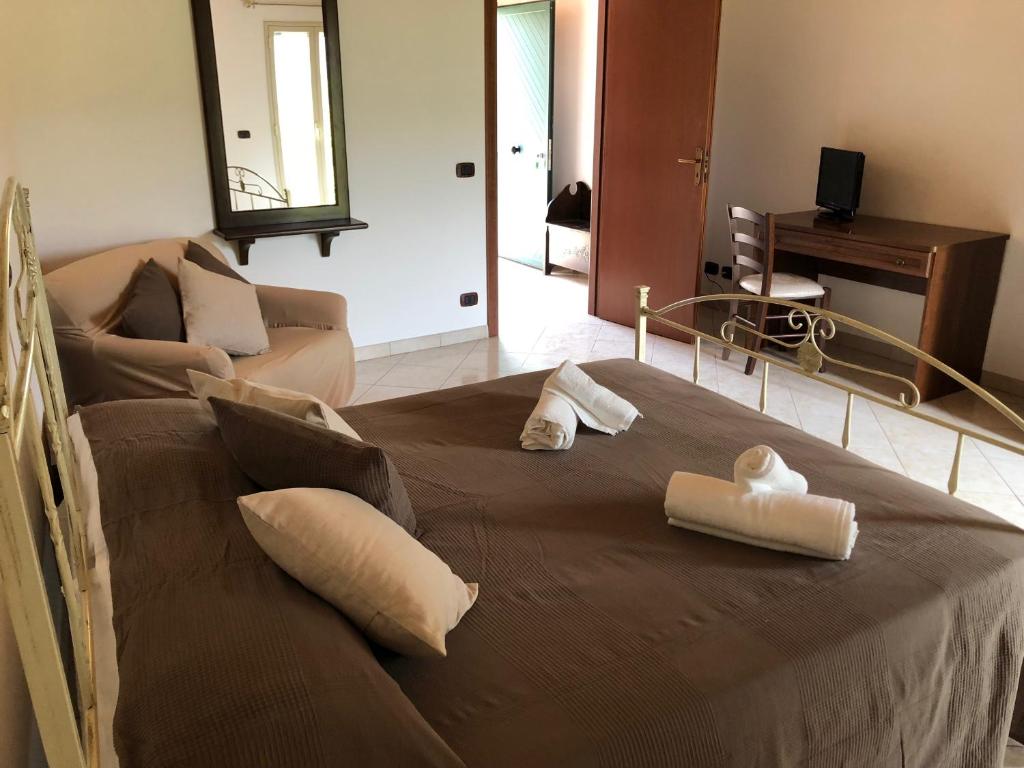 Postel nebo postele na pokoji v ubytování Casa Vacanze Alcantara