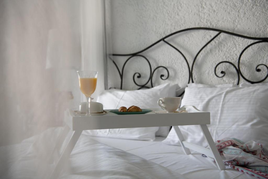 Postel nebo postele na pokoji v ubytování Porto Maltese Boutique Estate