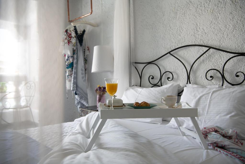 Postel nebo postele na pokoji v ubytování Porto Maltese Boutique Estate