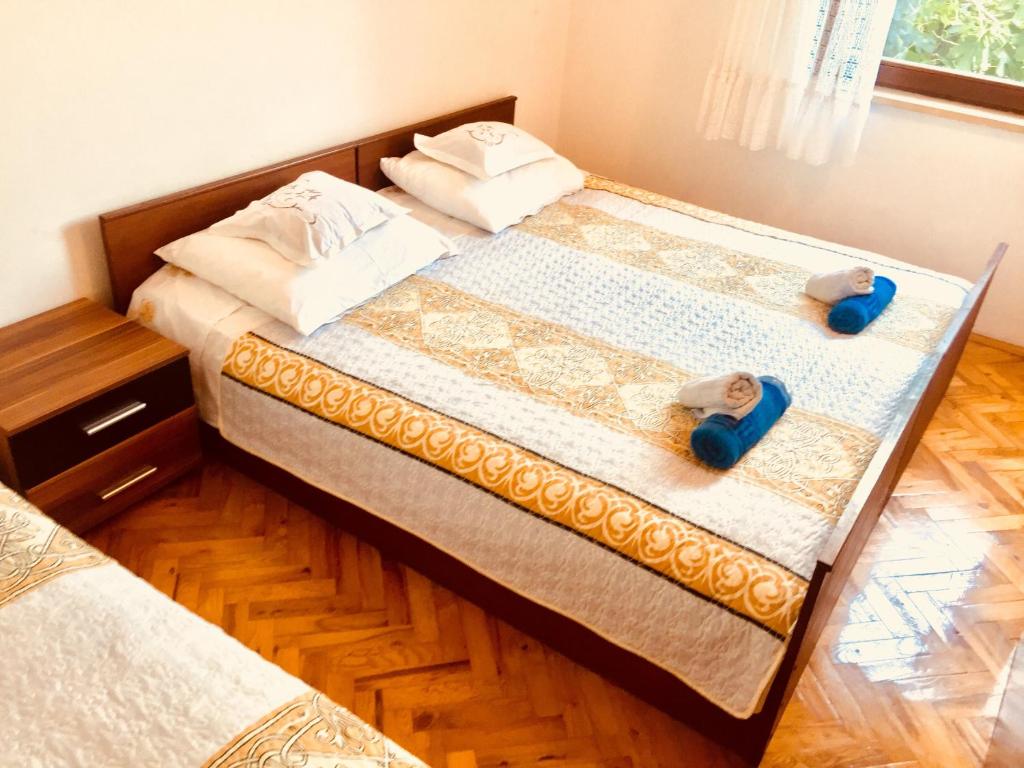 Postel nebo postele na pokoji v ubytování Apartment Martinovic