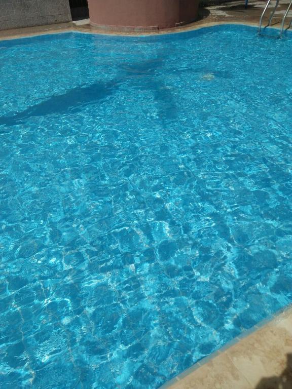 Bazén v ubytování Riad Côté palmeraie nebo v jeho okolí
