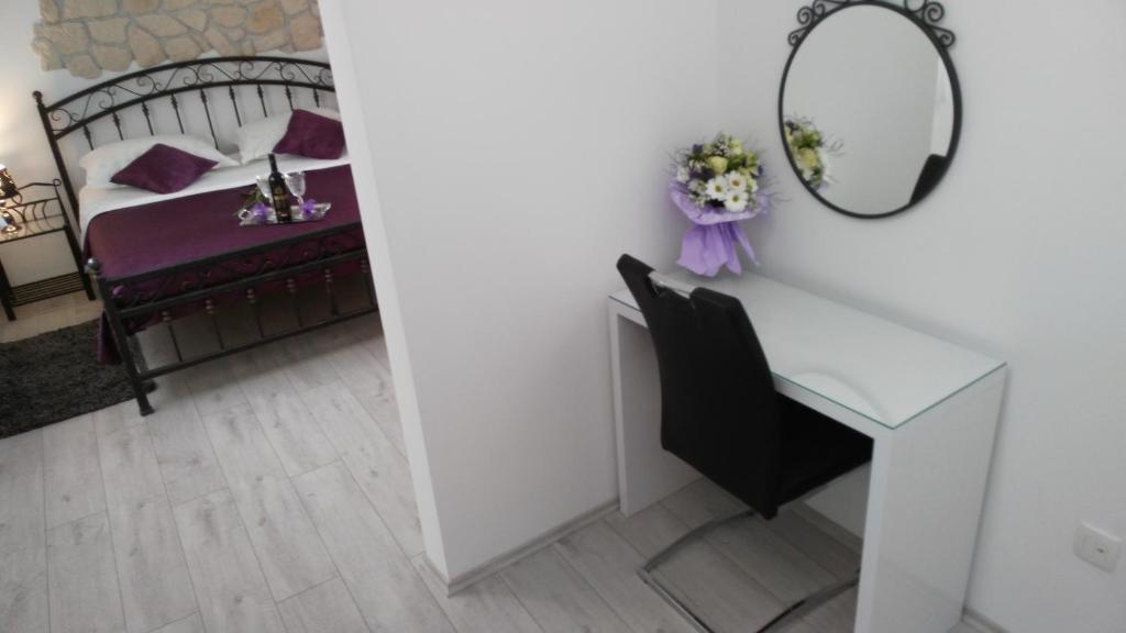 Posteľ alebo postele v izbe v ubytovaní Kuzma Rooms and Apartments
