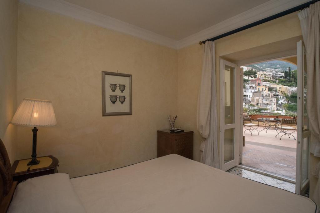 מיטה או מיטות בחדר ב-Hotel Posa Posa