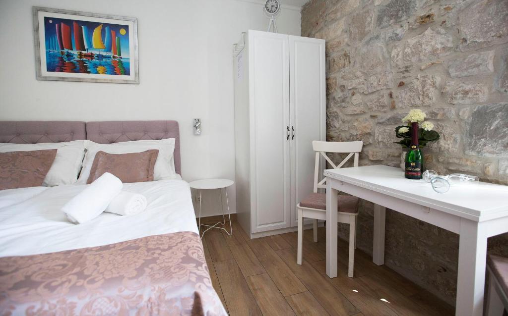 Postel nebo postele na pokoji v ubytování Guest House Paradise