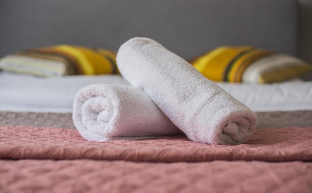 Posteľ alebo postele v izbe v ubytovaní Apartamenty Centrum