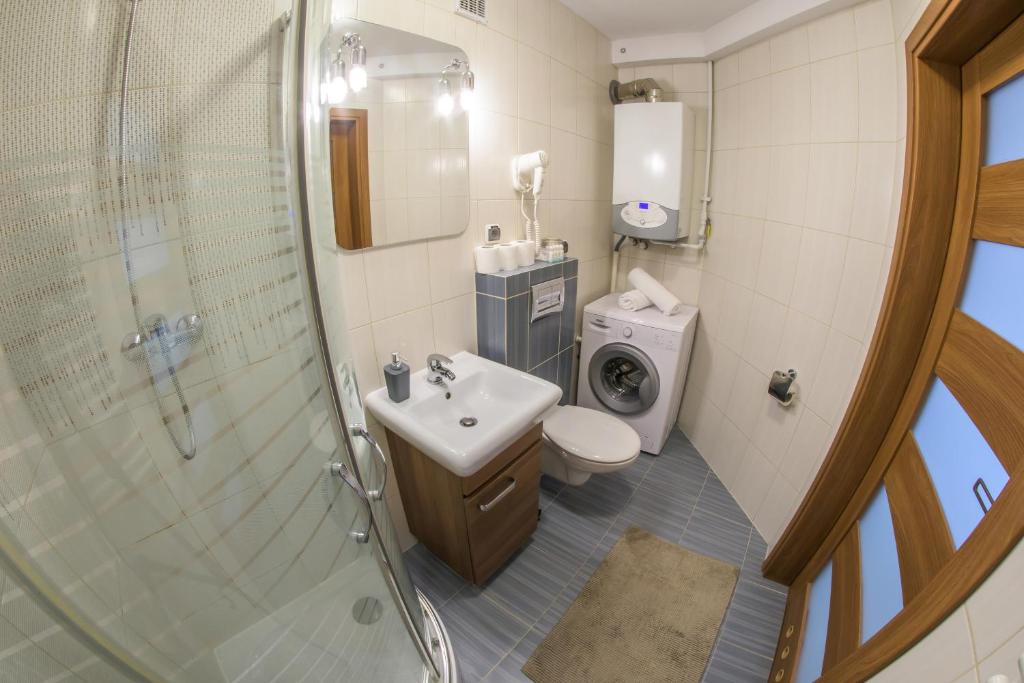 Kúpeľňa v ubytovaní Apartamenty Centrum