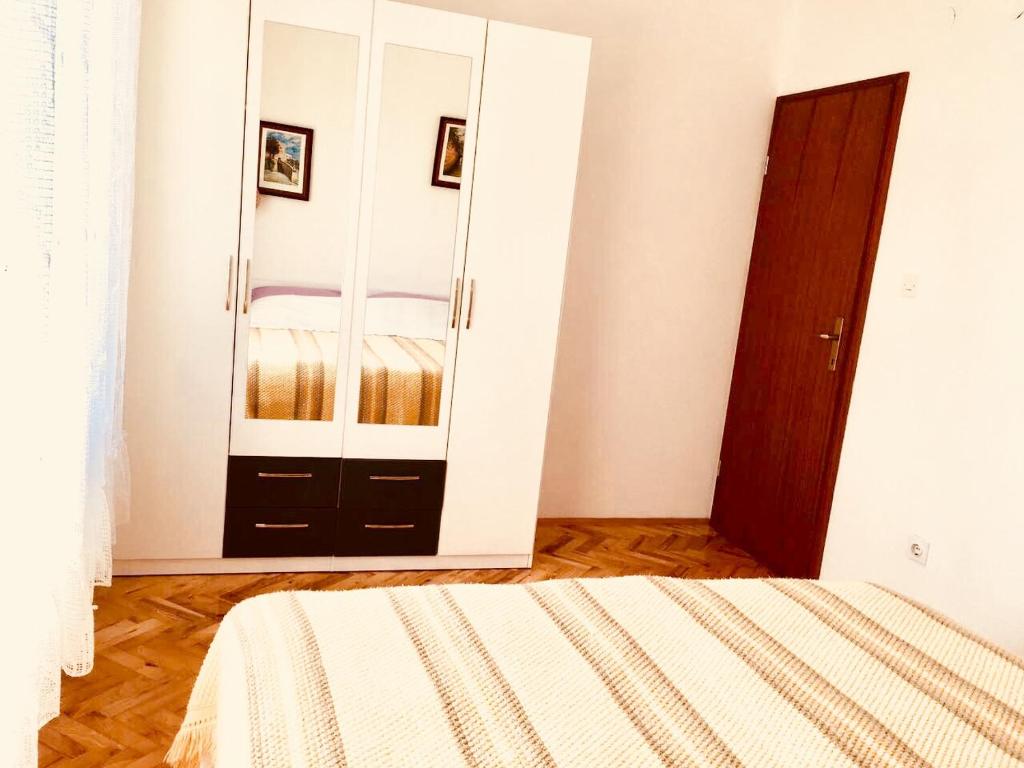 Postel nebo postele na pokoji v ubytování Apartment Martinovic