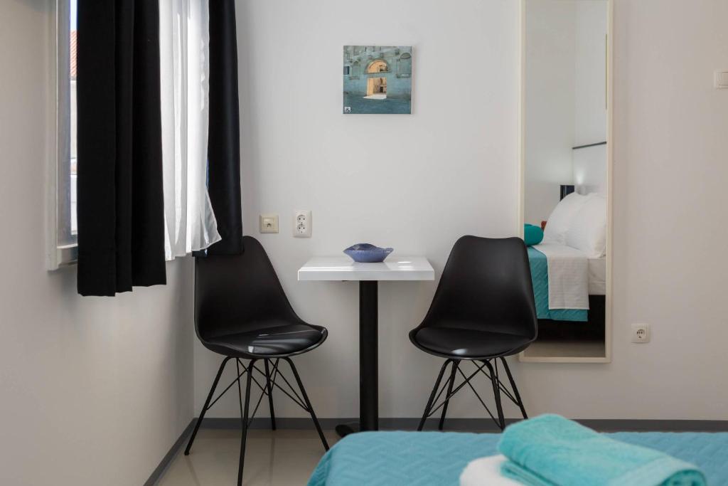 Posteľ alebo postele v izbe v ubytovaní PLR Luxury Rooms