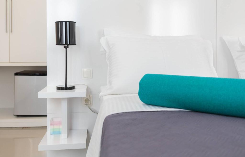 Posteľ alebo postele v izbe v ubytovaní PLR Luxury Rooms