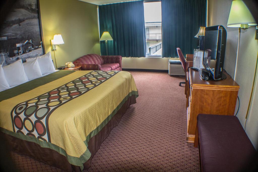 Postel nebo postele na pokoji v ubytování Econo Lodge