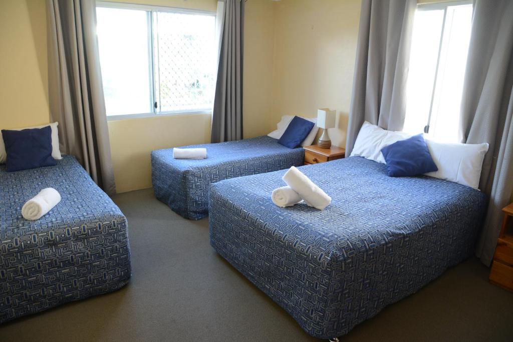 Postel nebo postele na pokoji v ubytování Bentleigh Motor Inn