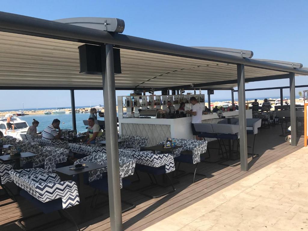 Restaurace v ubytování Guesthouse Punta Mira - Beachfront