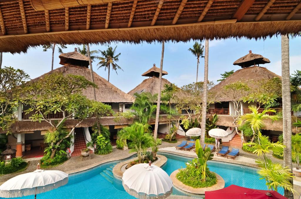 an image of a resort with a swimming pool at Sativa Sanur Cottages in Sanur