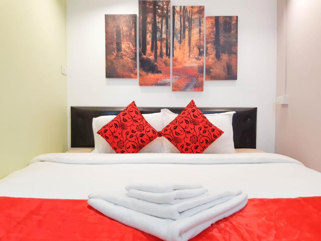 Katil atau katil-katil dalam bilik di Khaosan Art Hotel - SHA Plus Certified