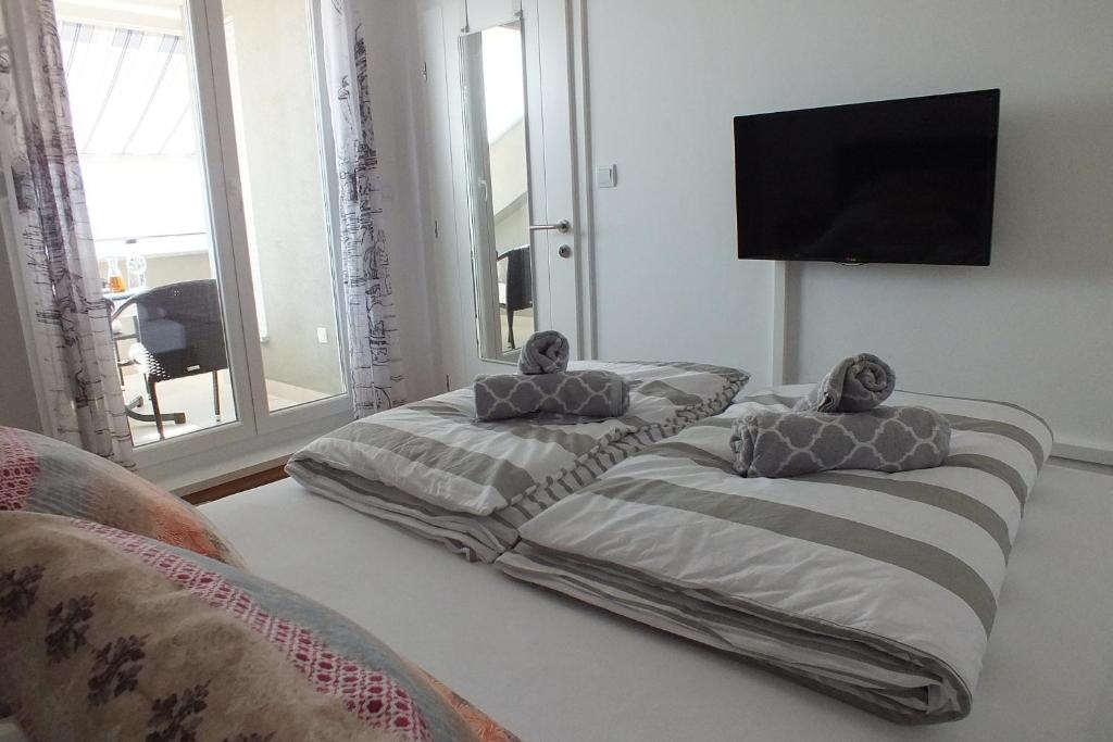 Postel nebo postele na pokoji v ubytování Apartment Silvija