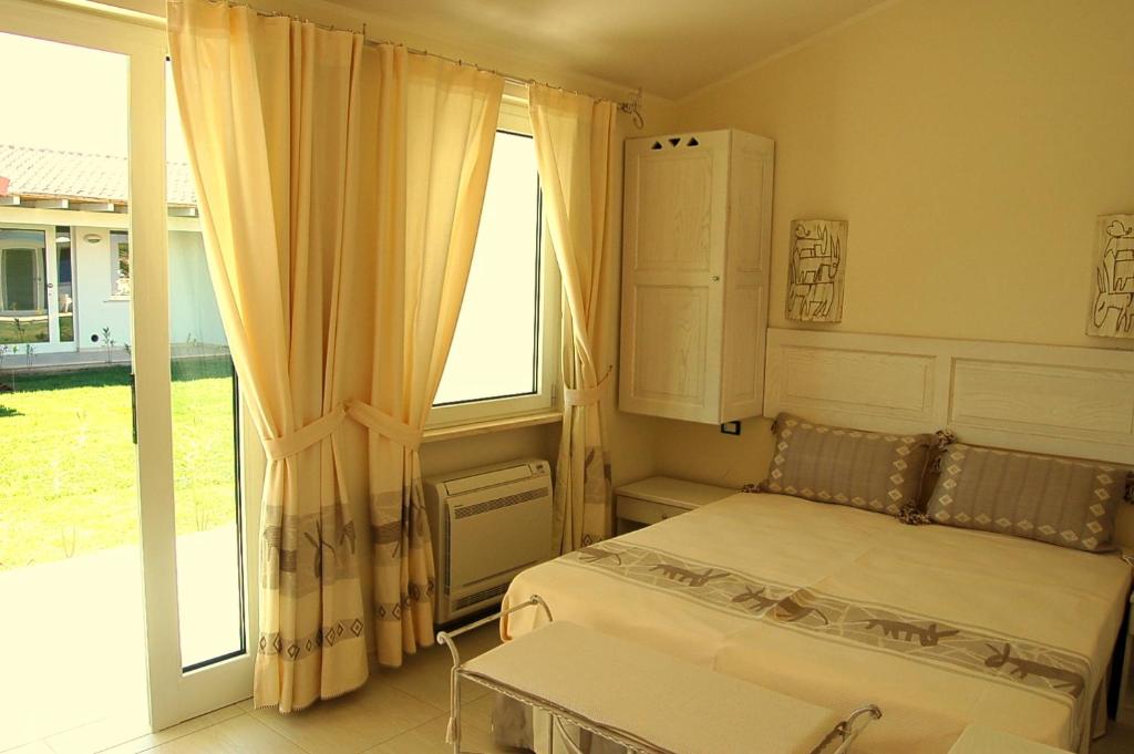 Posezení v ubytování Hotel Budoni Beach