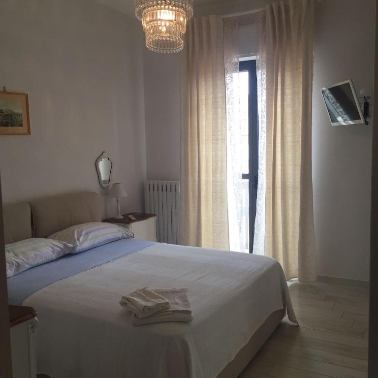 A bed or beds in a room at Medeum