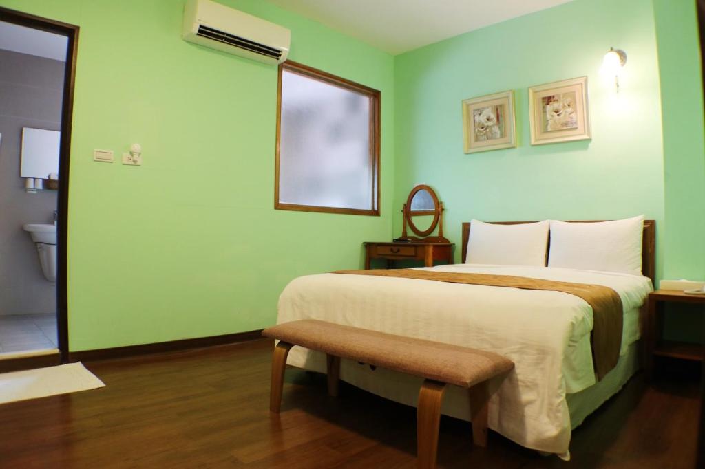 Postel nebo postele na pokoji v ubytování Fungo Hotel