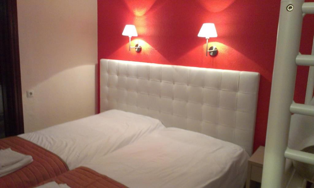 Postel nebo postele na pokoji v ubytování Makedonia Hotel