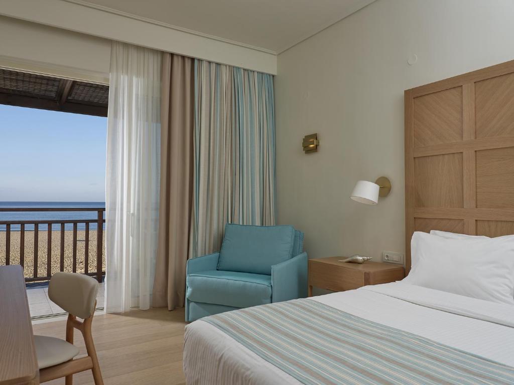 Postel nebo postele na pokoji v ubytování Pilot Beach Resort