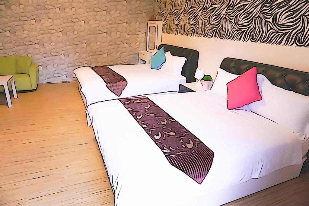 A bed or beds in a room at Donggang Hai-Wan Homestay