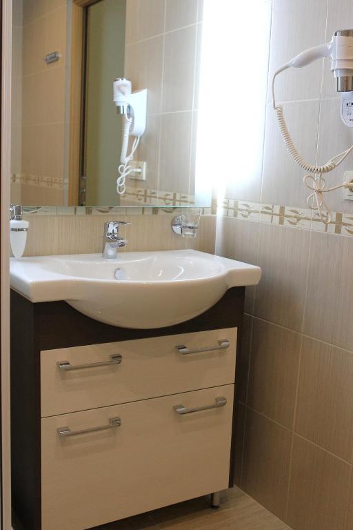 Koupelna v ubytování Hotel Asteri