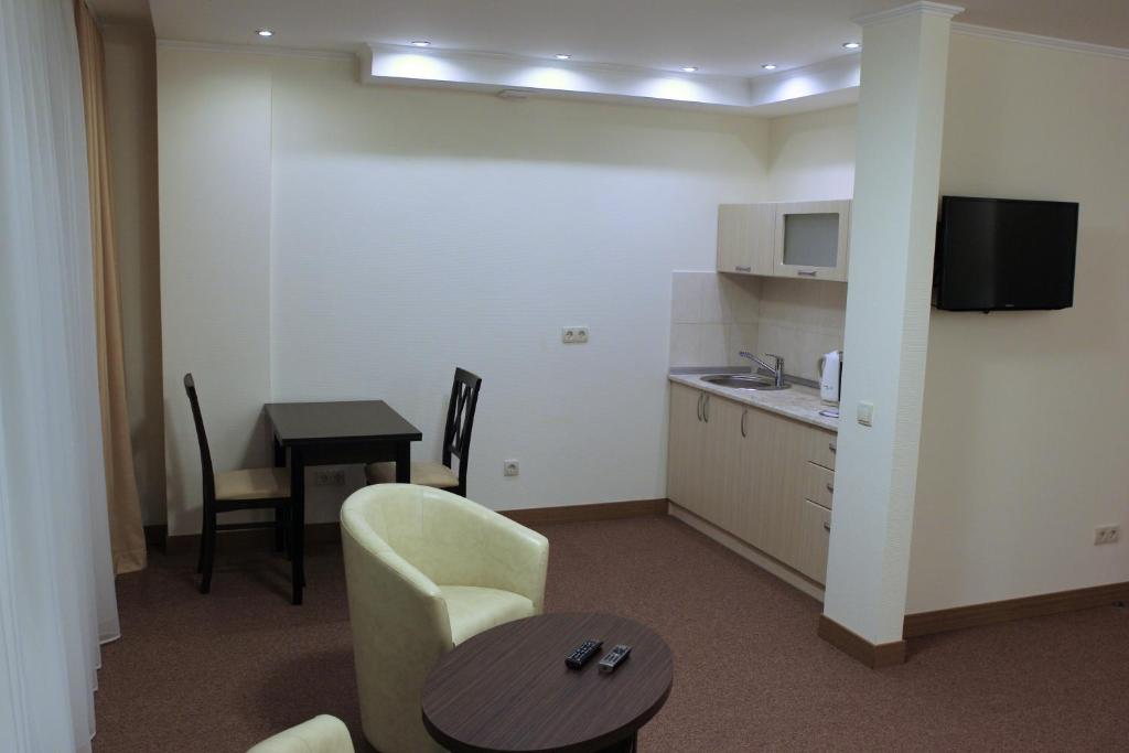 Kuchyň nebo kuchyňský kout v ubytování Hotel Asteri