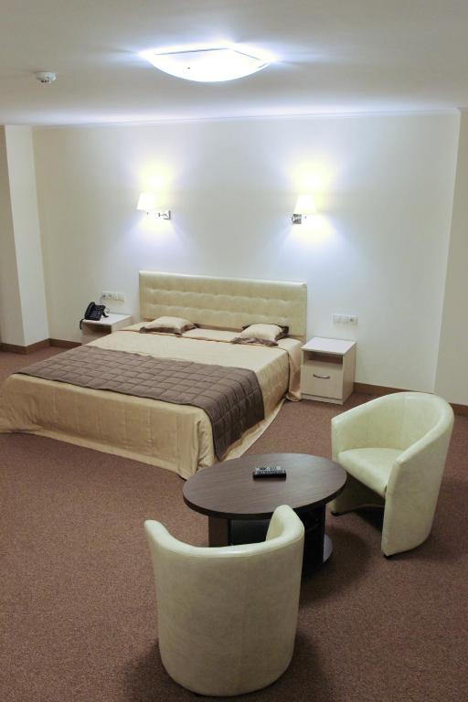 Postel nebo postele na pokoji v ubytování Hotel Asteri