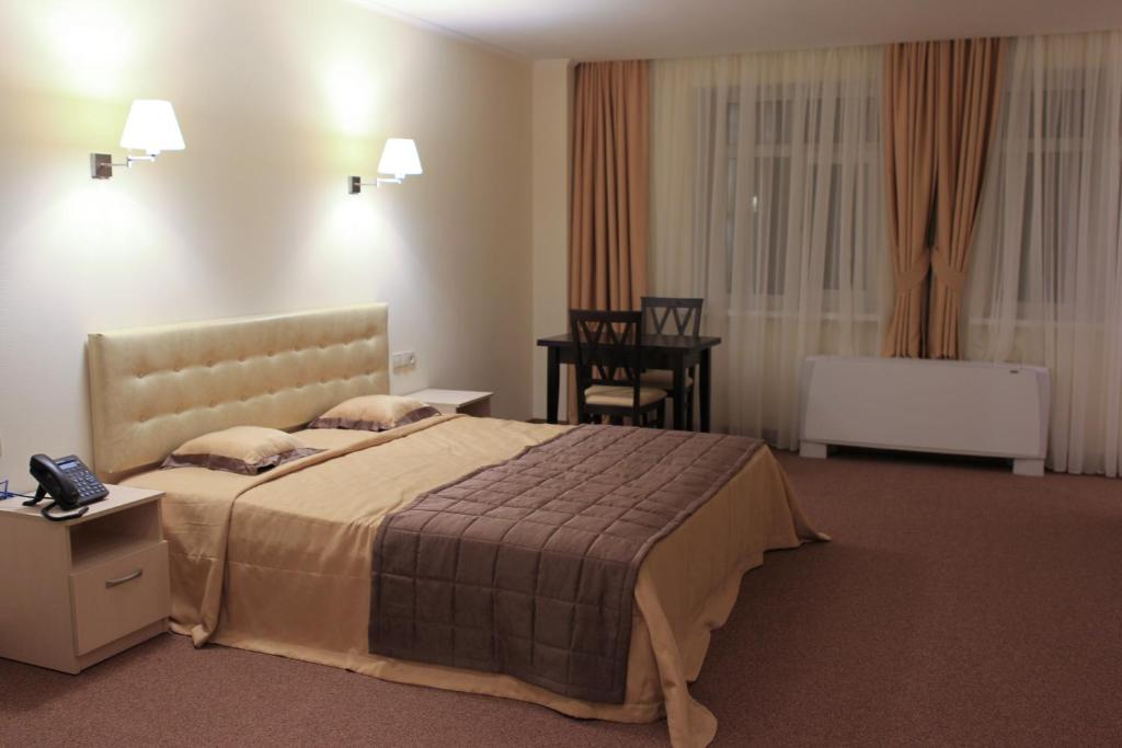 Postel nebo postele na pokoji v ubytování Hotel Asteri