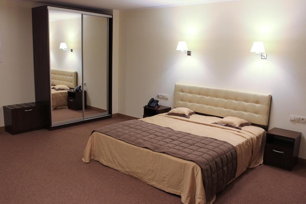 Postel nebo postele na pokoji v ubytování Hotel Asteri