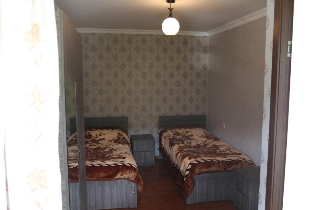 Postel nebo postele na pokoji v ubytování Khergiansha