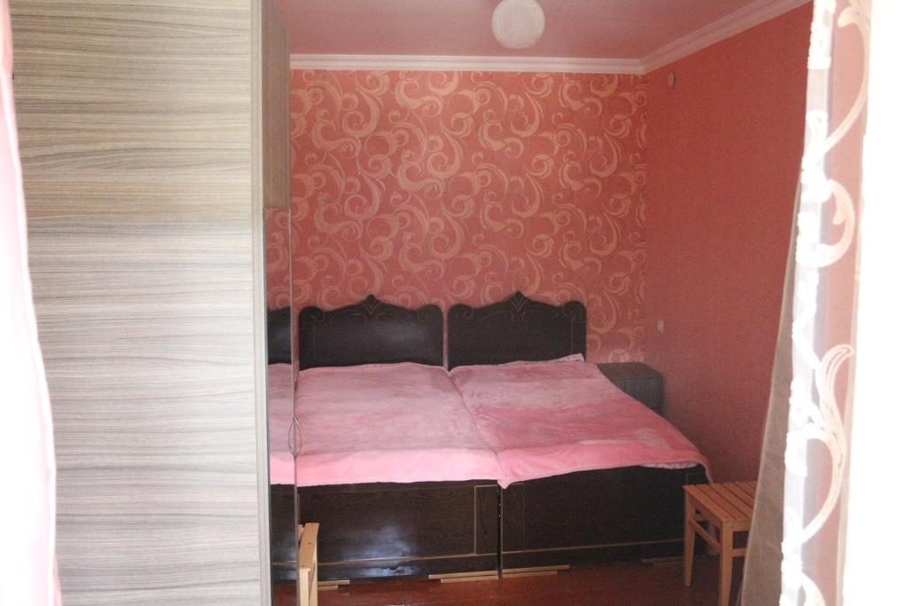 Postel nebo postele na pokoji v ubytování Khergiansha
