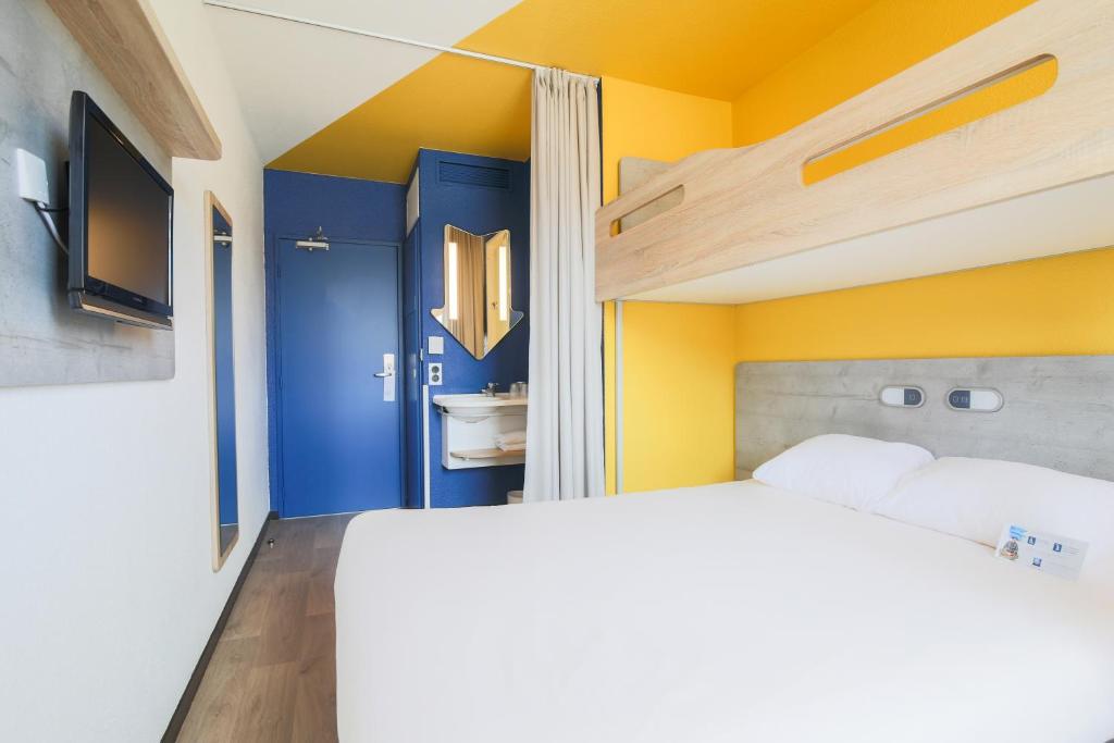 Llit o llits en una habitació de Ibis Budget Albi Centre
