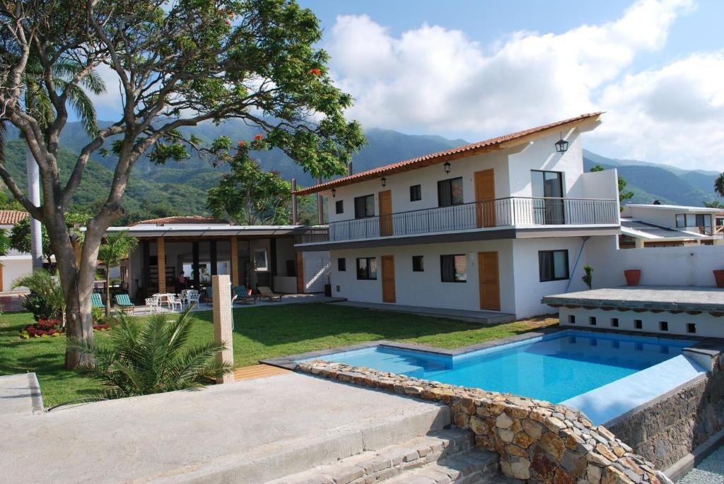 Bazén v ubytování Hotel La Ribereña nebo v jeho okolí