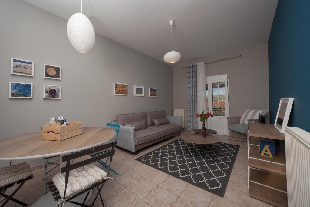 A seating area at Live in Lemnos Apartments