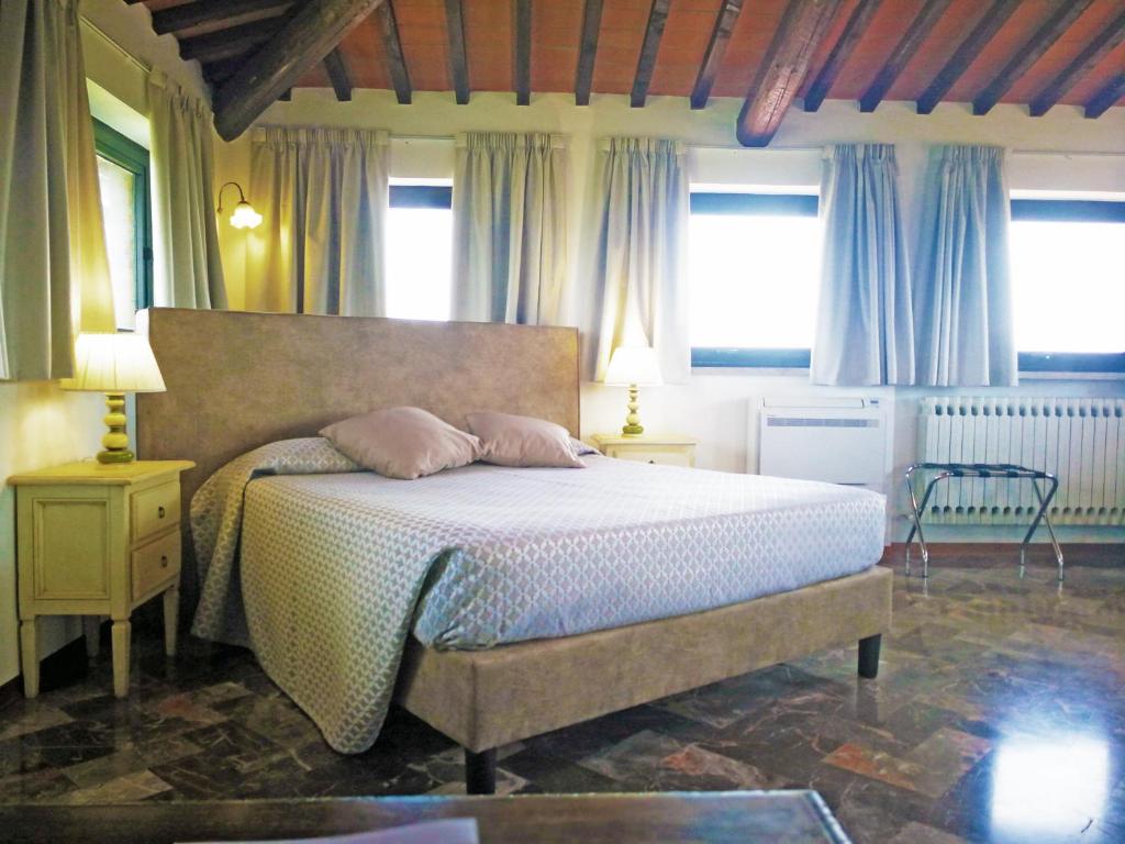 Postel nebo postele na pokoji v ubytování La Loggia - Villa Gloria -Adults Only