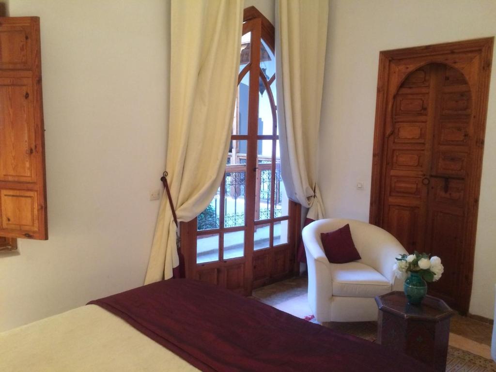 Postel nebo postele na pokoji v ubytování Riad Irene