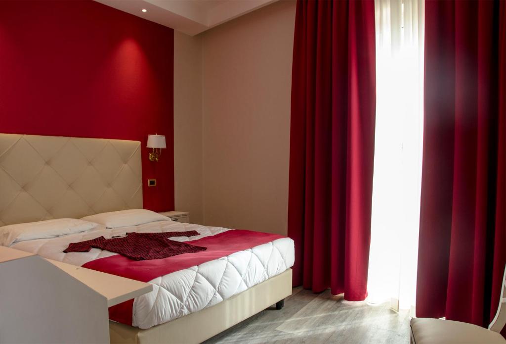 Postel nebo postele na pokoji v ubytování Hotel Settentrionale Esplanade