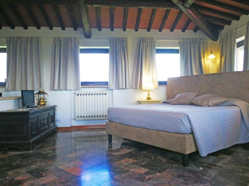 Postel nebo postele na pokoji v ubytování La Loggia - Villa Gloria -Adults Only