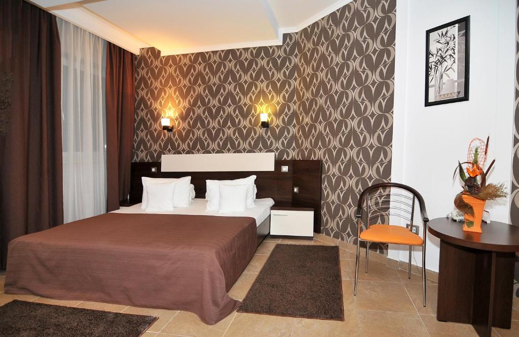 Postel nebo postele na pokoji v ubytování Hotel Confort
